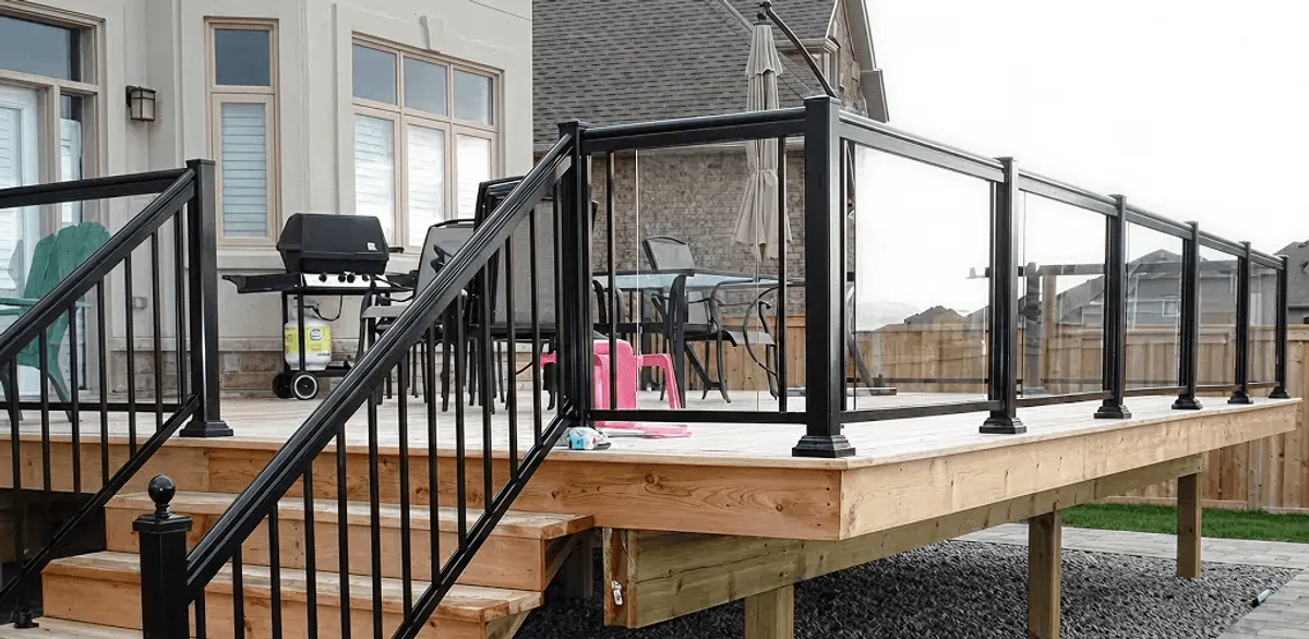 Handrail installation on a deck staircase for safety and code compliance in Little Rock, AR